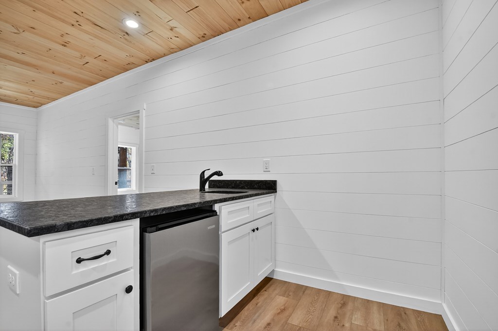 85 Duck Cove Morganton, GA 30560 - Photo 23 of 36 a kitchen with a sink and cabinets