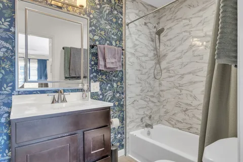 a bathroom with a sink and a bathtub