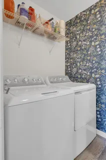 a utility room with dryer and washer