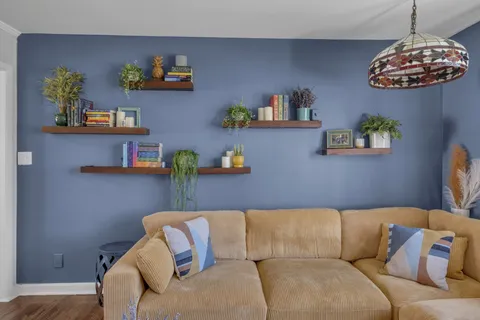 a living room with furniture and a couch