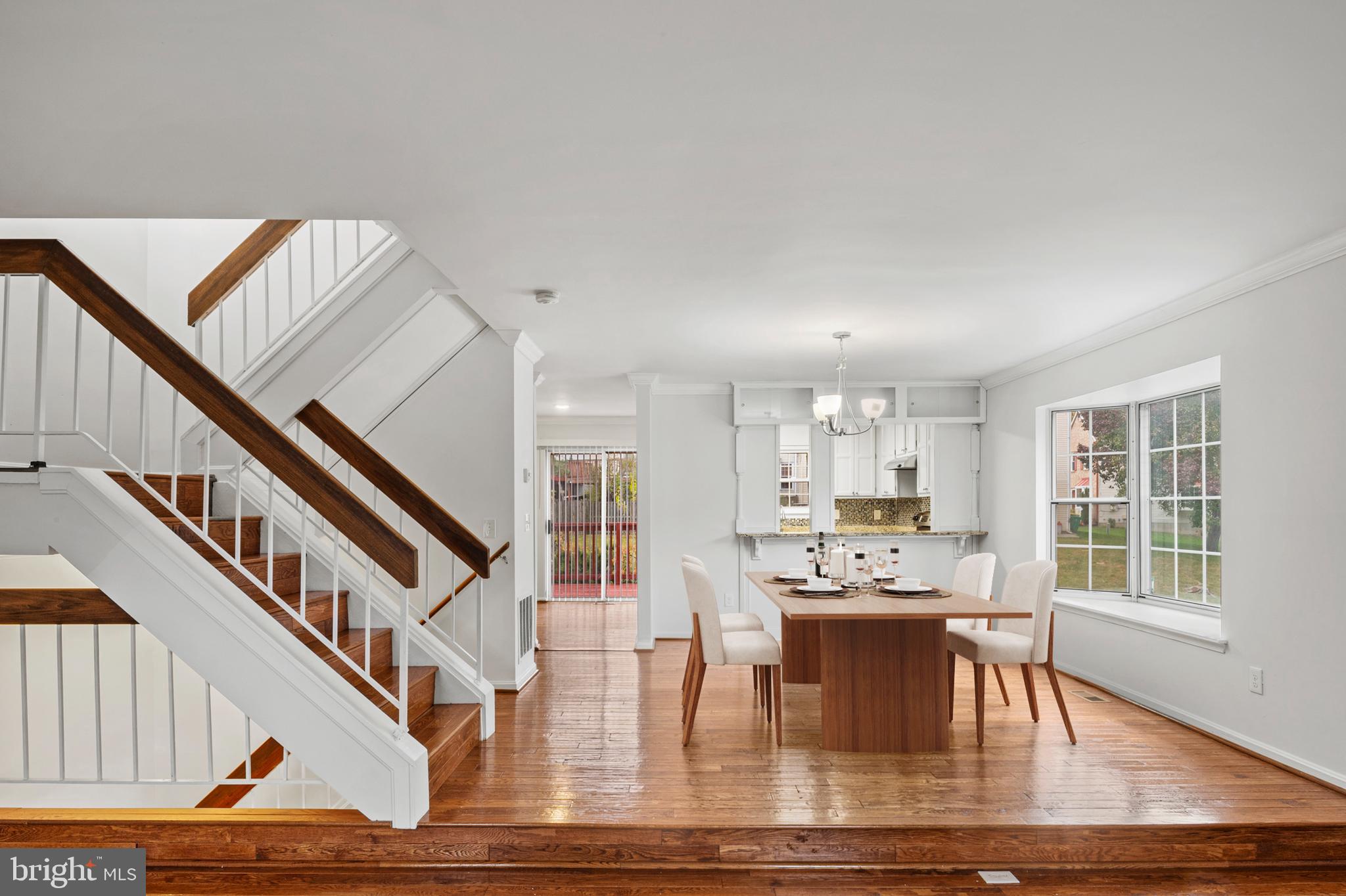 7022 Storch Lane Lanham, MD 20706 - Photo 15 of 44 Virtually staged dining room.
