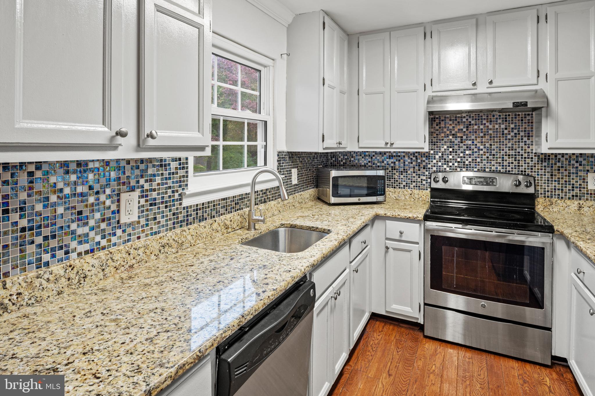 7022 Storch Lane Lanham, MD 20706 - Photo 20 of 44 Kitchen has granite countertops & SS appliances!