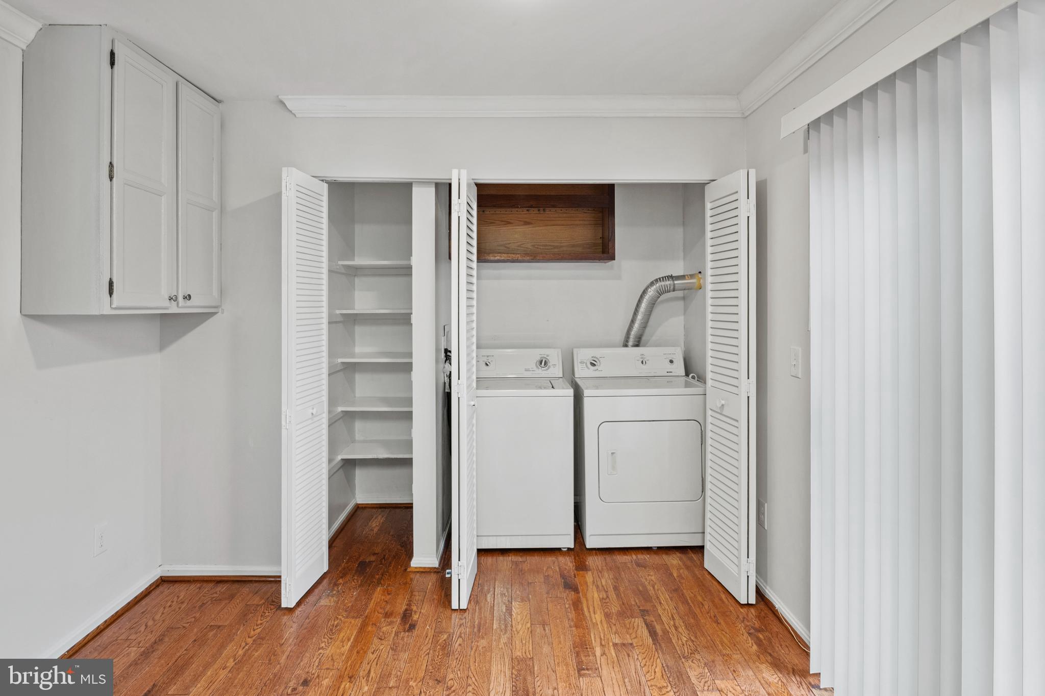7022 Storch Lane Lanham, MD 20706 - Photo 24 of 44 Laundry area w/ storage is next to the pantry!
