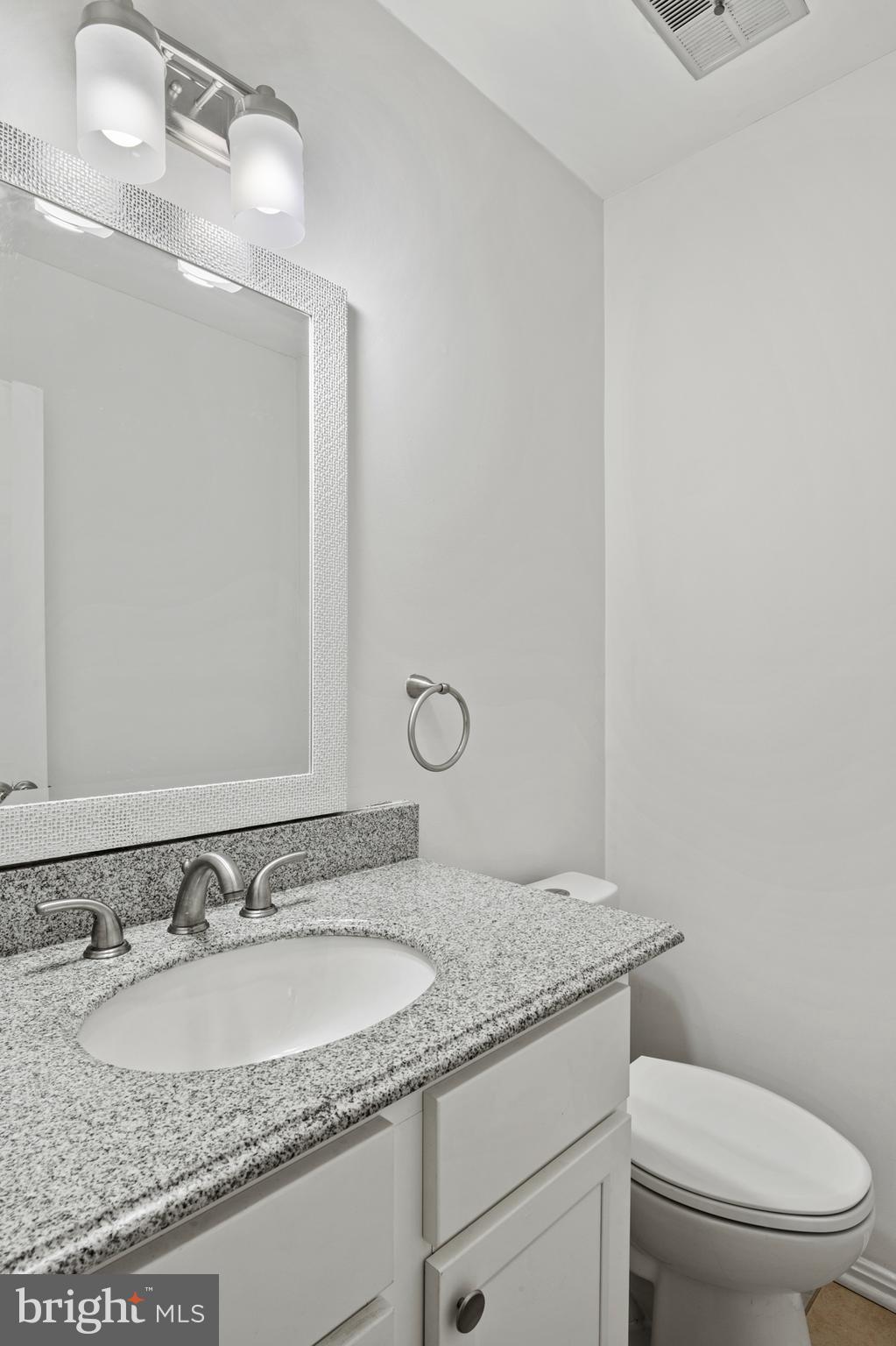 7022 Storch Lane Lanham, MD 20706 - Photo 25 of 44 Convenient half bathroom on the main level. K