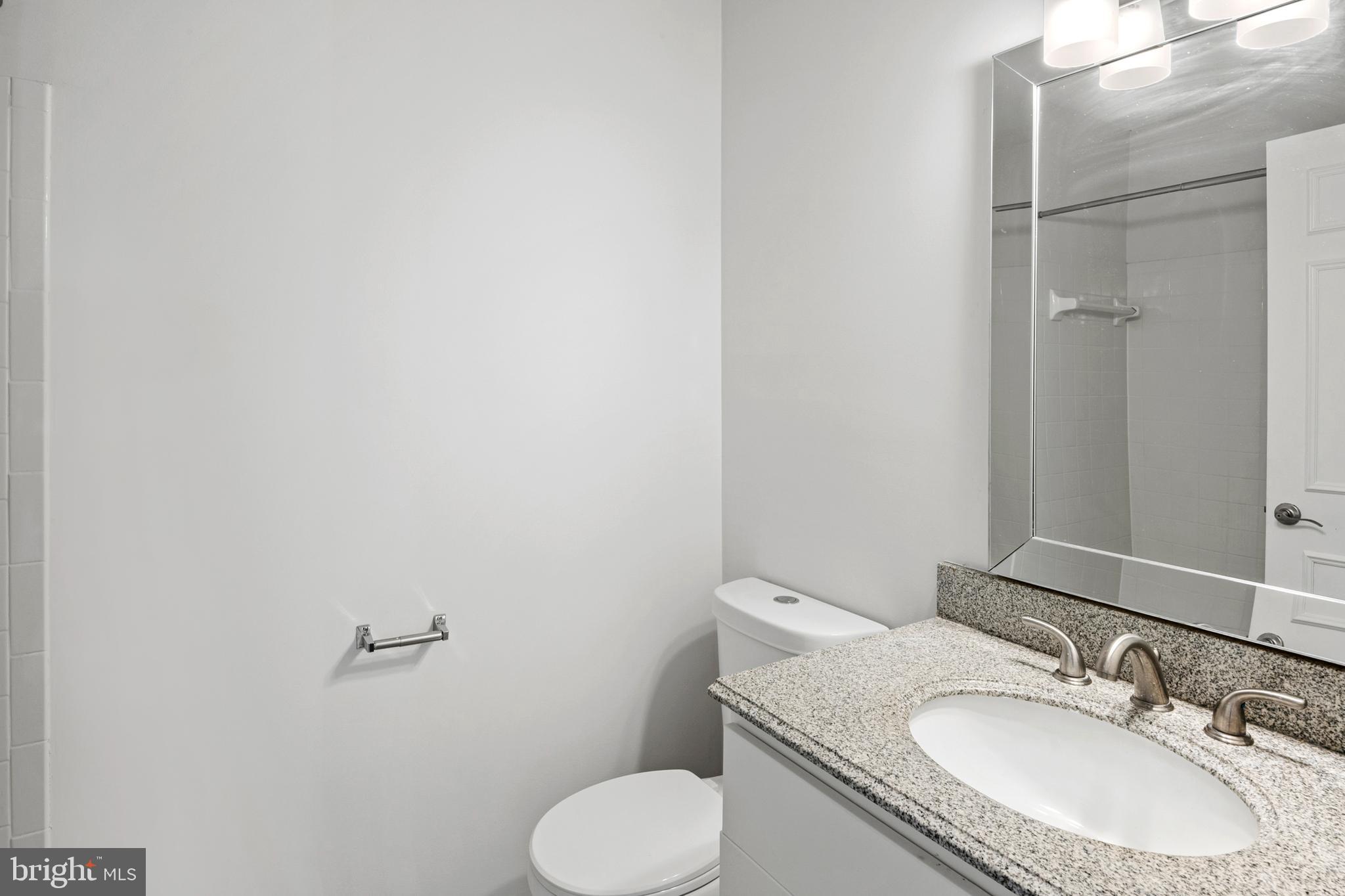 7022 Storch Lane Lanham, MD 20706 - Photo 38 of 44 Upgraded full bathroom on upper level.