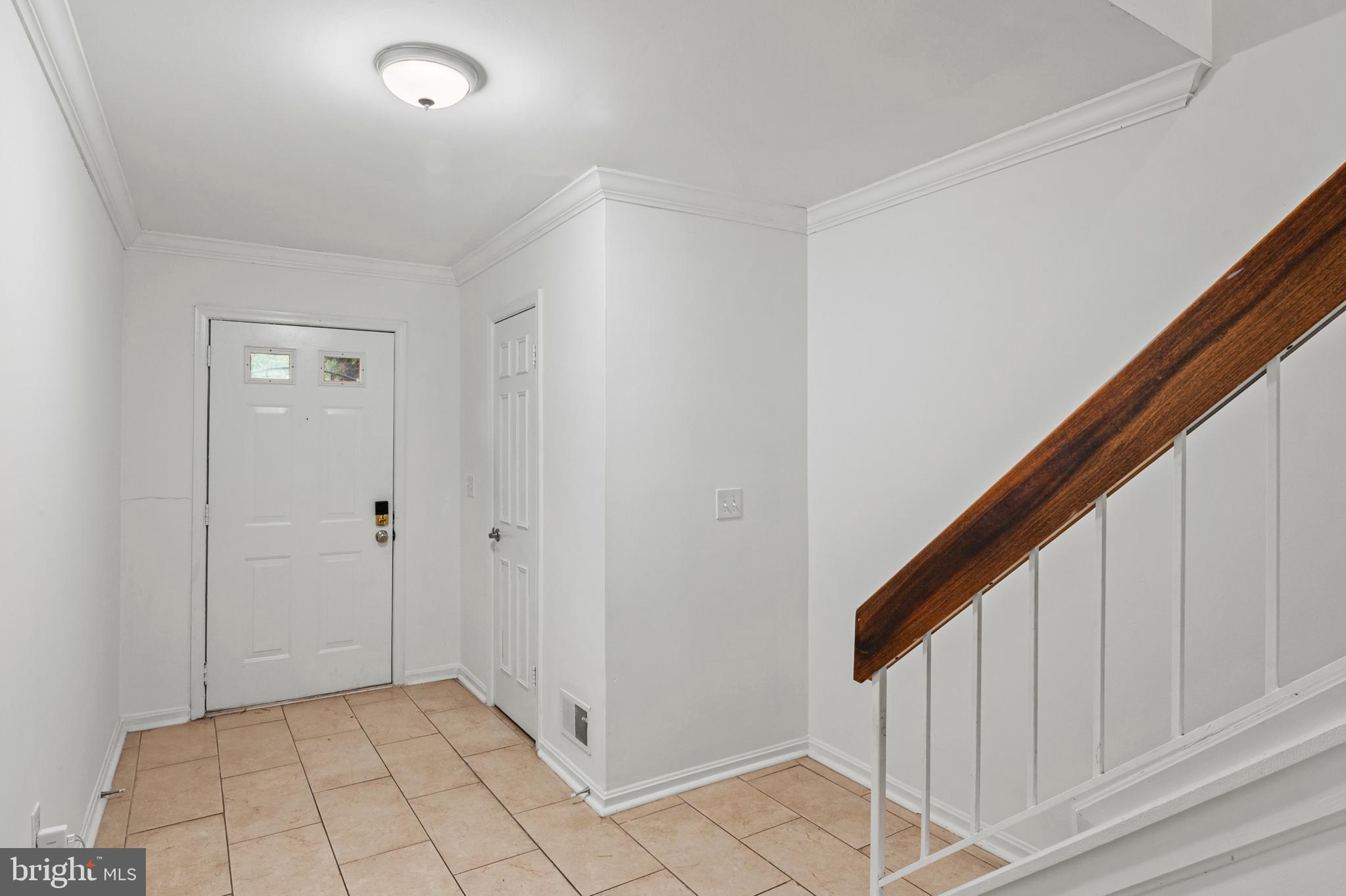 7022 Storch Lane Lanham, MD 20706 - Photo 4 of 44 Welcoming main entrance with ceramic tile.