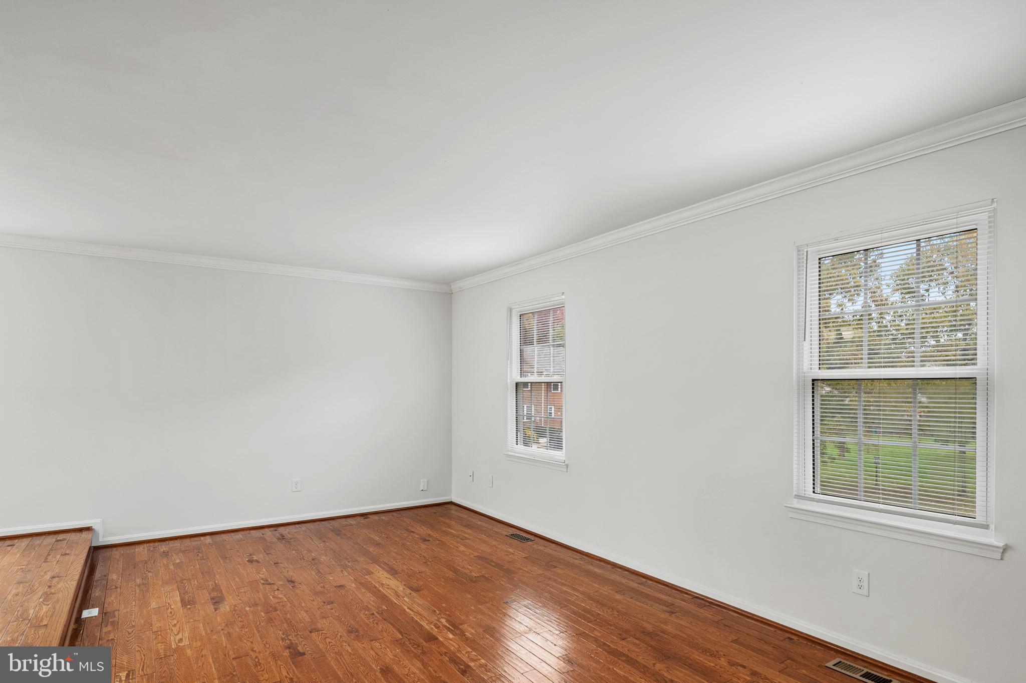 7022 Storch Lane Lanham, MD 20706 - Photo 10 of 44 Spacious living room with gleaming hardwoods!