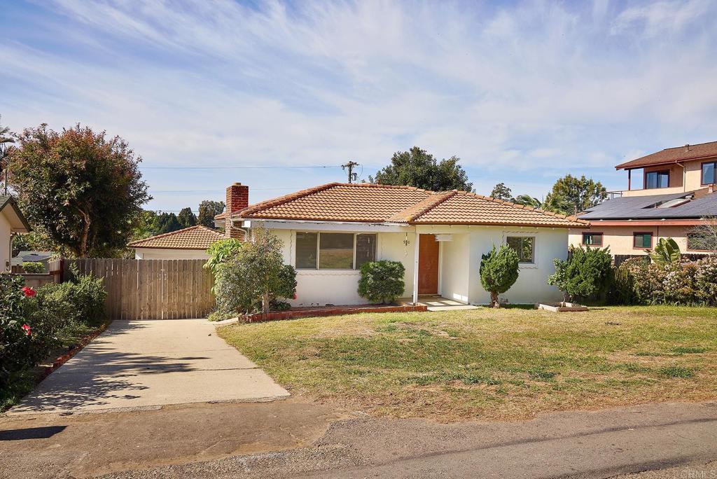 920 Stratford Drive Encinitas, CA 92024 - Photo 2 of 57 a front view of a house with a yard