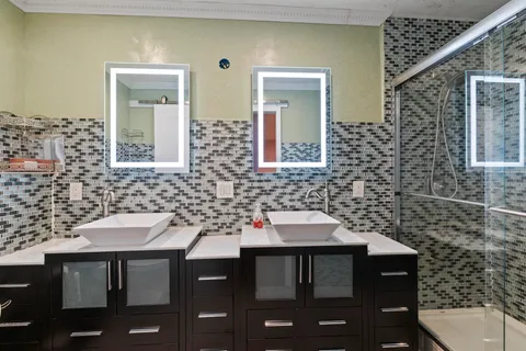 a bedroom with bed and a window