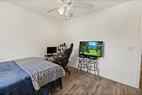 a view of an empty room with a bathroom