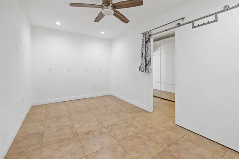 an aerial view of residential house with outdoor space