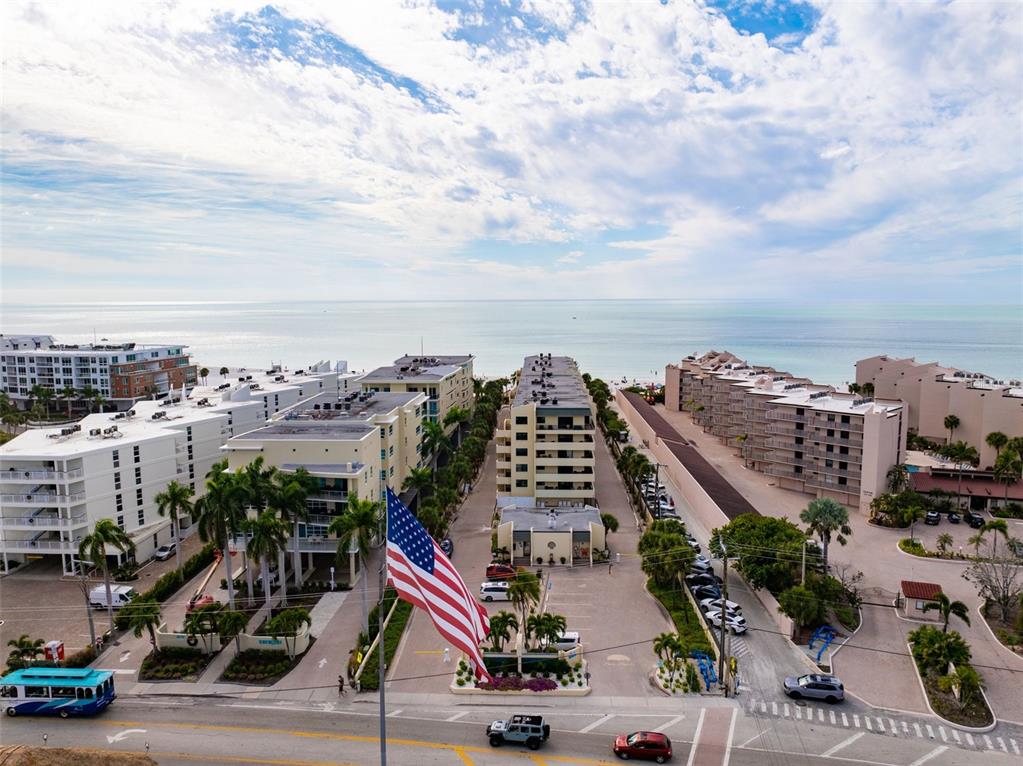 6500 Midnight Pass Road, Unit 208 Sarasota, FL 34242 - Photo 31 of 36 a city view with tall buildings