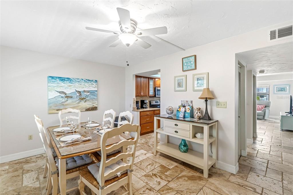 6500 Midnight Pass Road, Unit 208 Sarasota, FL 34242 - Photo 7 of 36 a living room with furniture and a view of kitchen