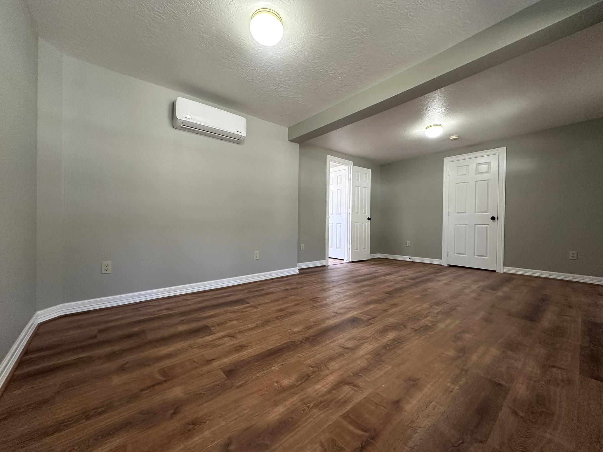 13868 Cedar Hill Road Montgomery, TX 77356 - Photo 13 of 19 an empty room with wooden floor and windows