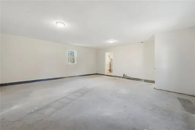 an empty room with a natural light