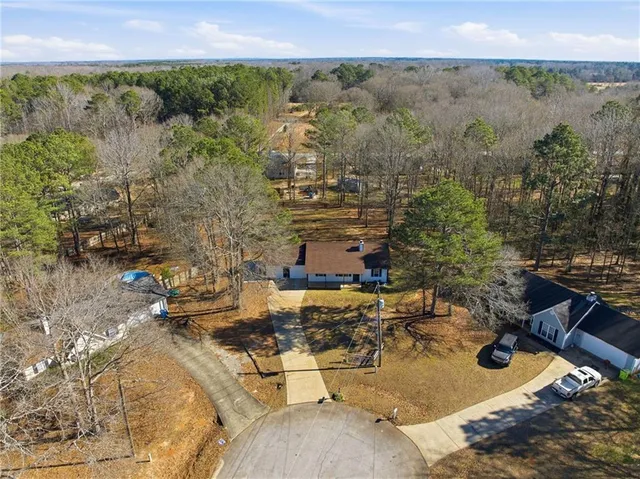 an aerial view of residential house with outdoor space