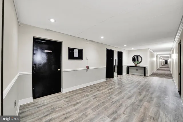 a view of a kitchen with a refrigerator