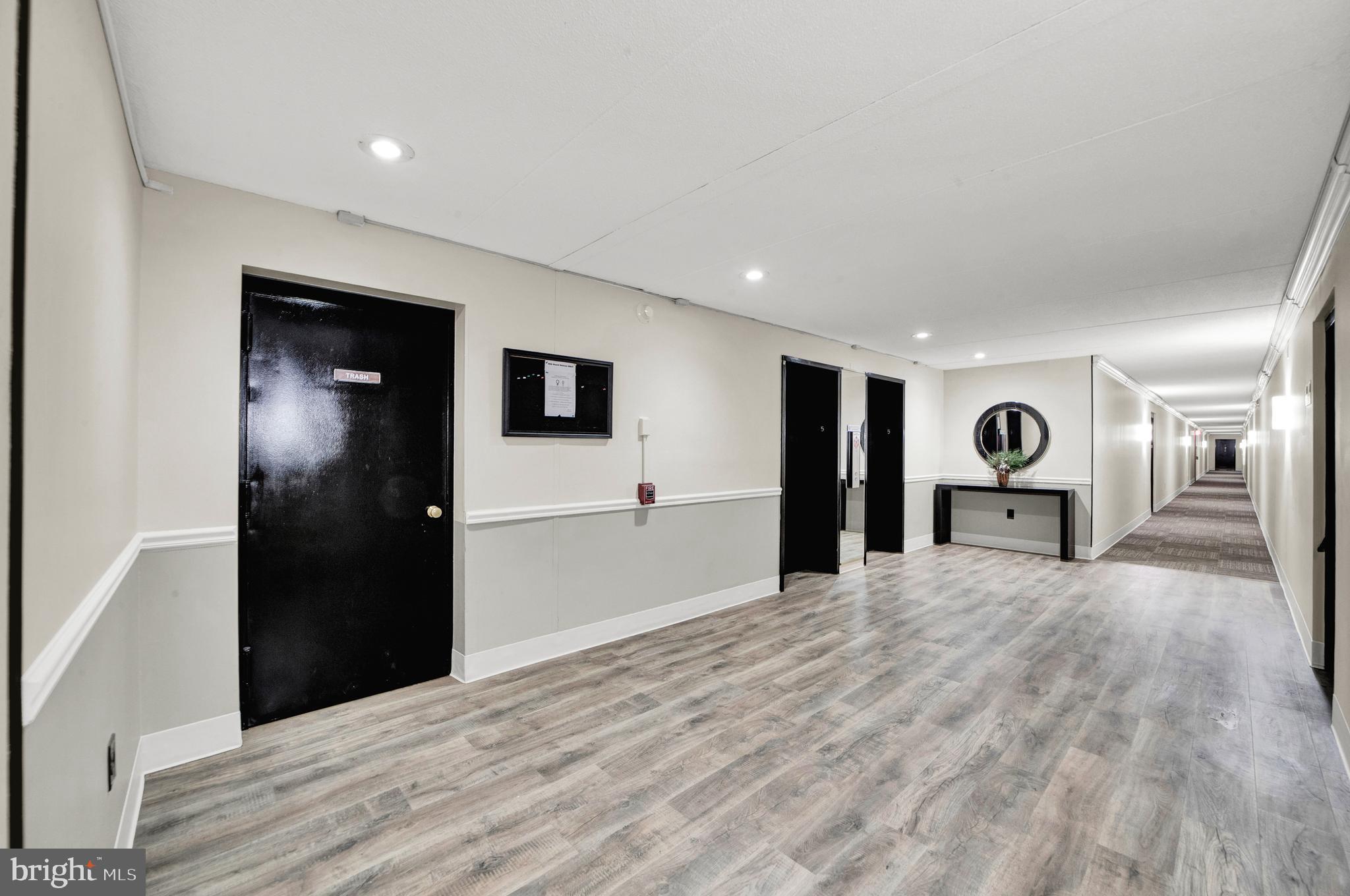 860 Lower Ferry Road, Unit 5P Ewing, NJ 08628 - Photo 23 of 29 a view of a kitchen with a refrigerator
