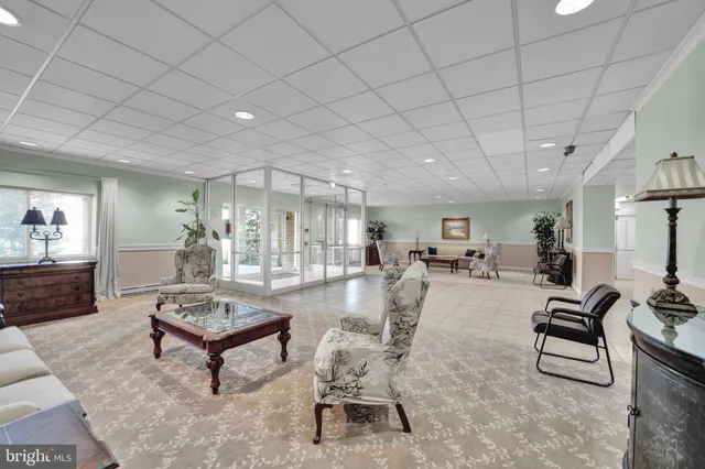 a living room with furniture and a table