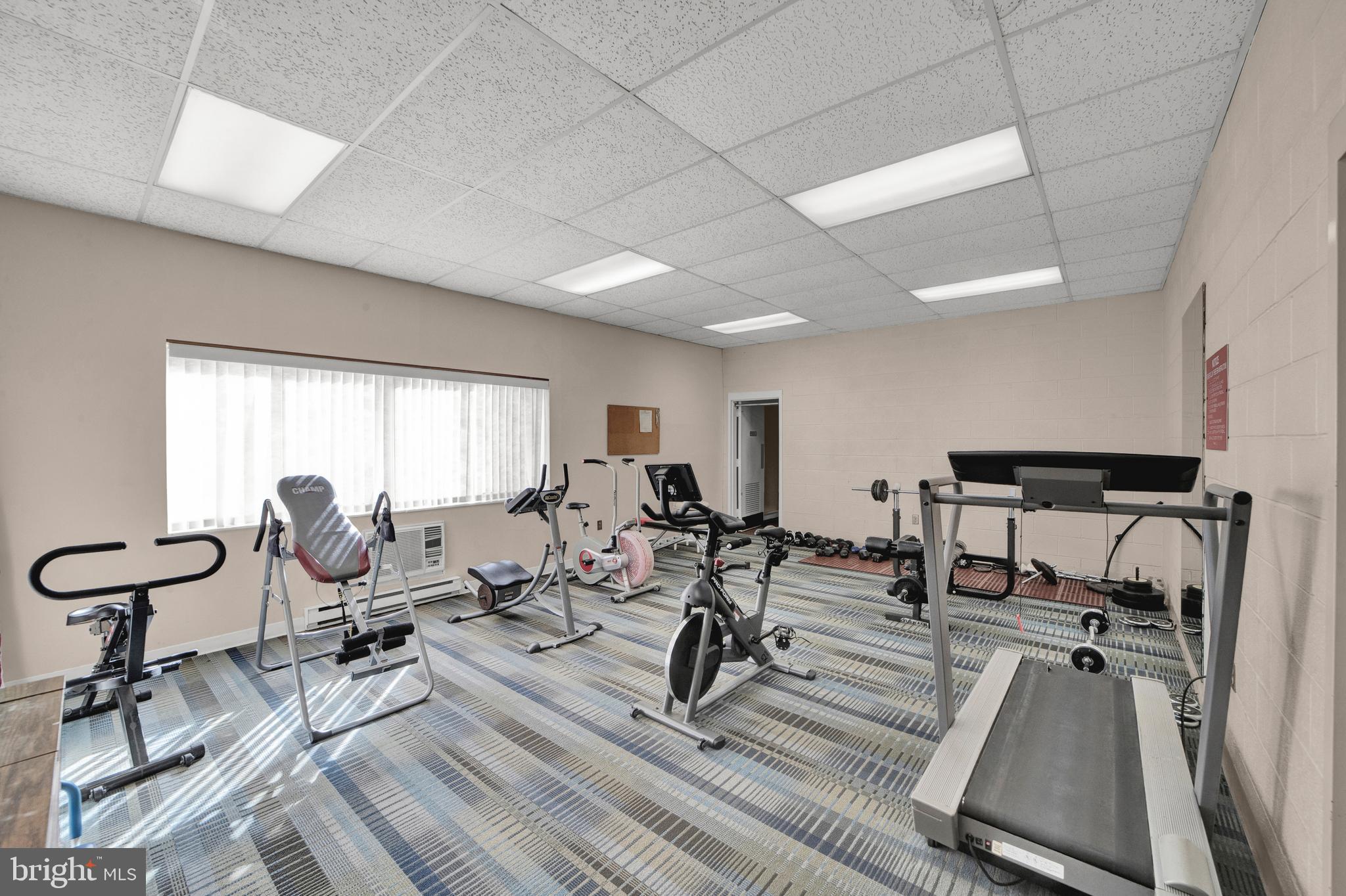 860 Lower Ferry Road, Unit 5P Ewing, NJ 08628 - Photo 25 of 29 a view of a room with gym equipment