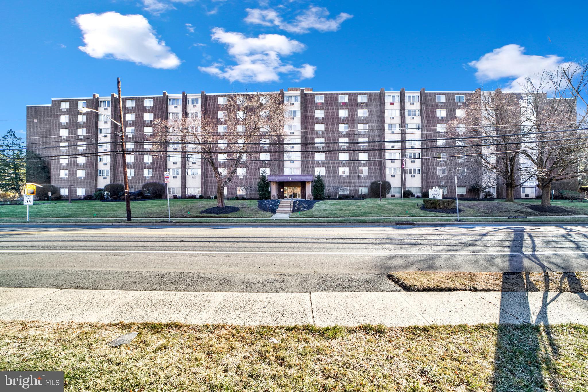 860 Lower Ferry Road, Unit 5P Ewing, NJ 08628 - Photo 29 of 29 a view of a building with a yard