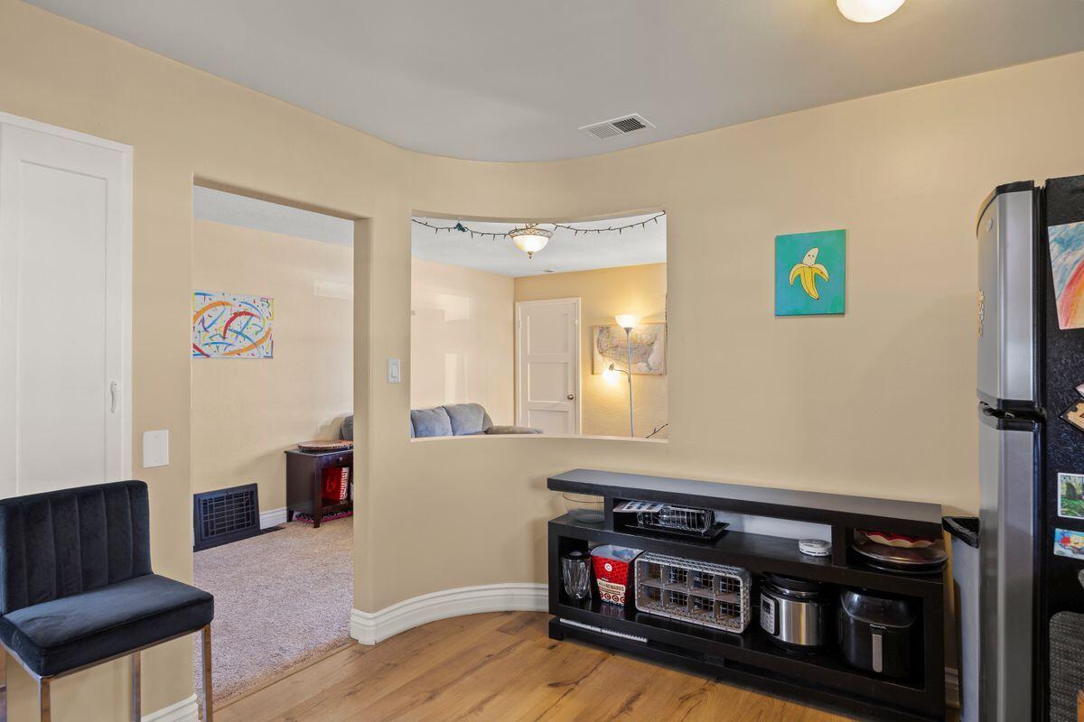 354 West Prospect Street Ventura, CA 93001 - Photo 11 of 41 a room with furniture and a flat screen tv