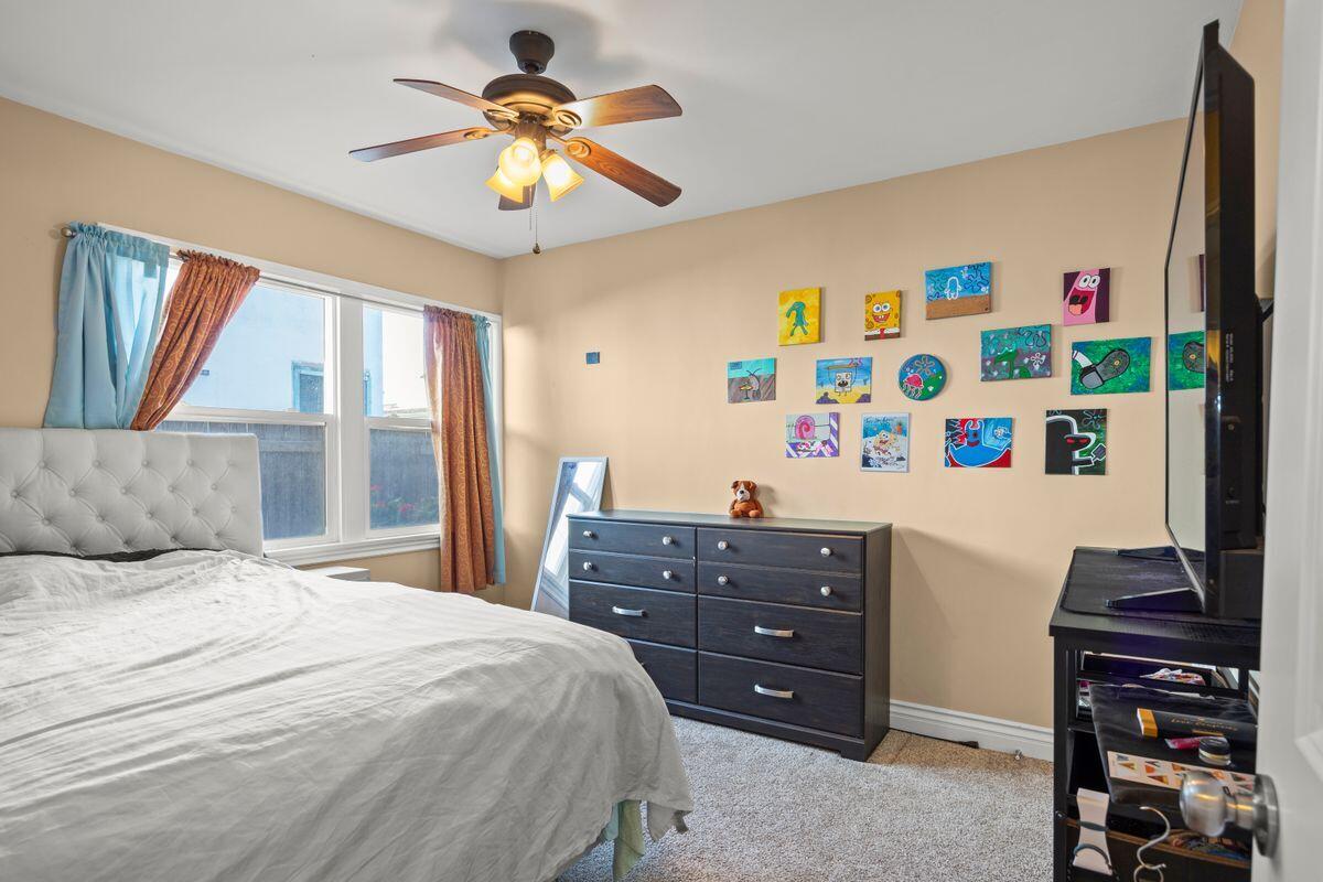354 West Prospect Street Ventura, CA 93001 - Photo 13 of 41 a bedroom with a bed dresser and a window
