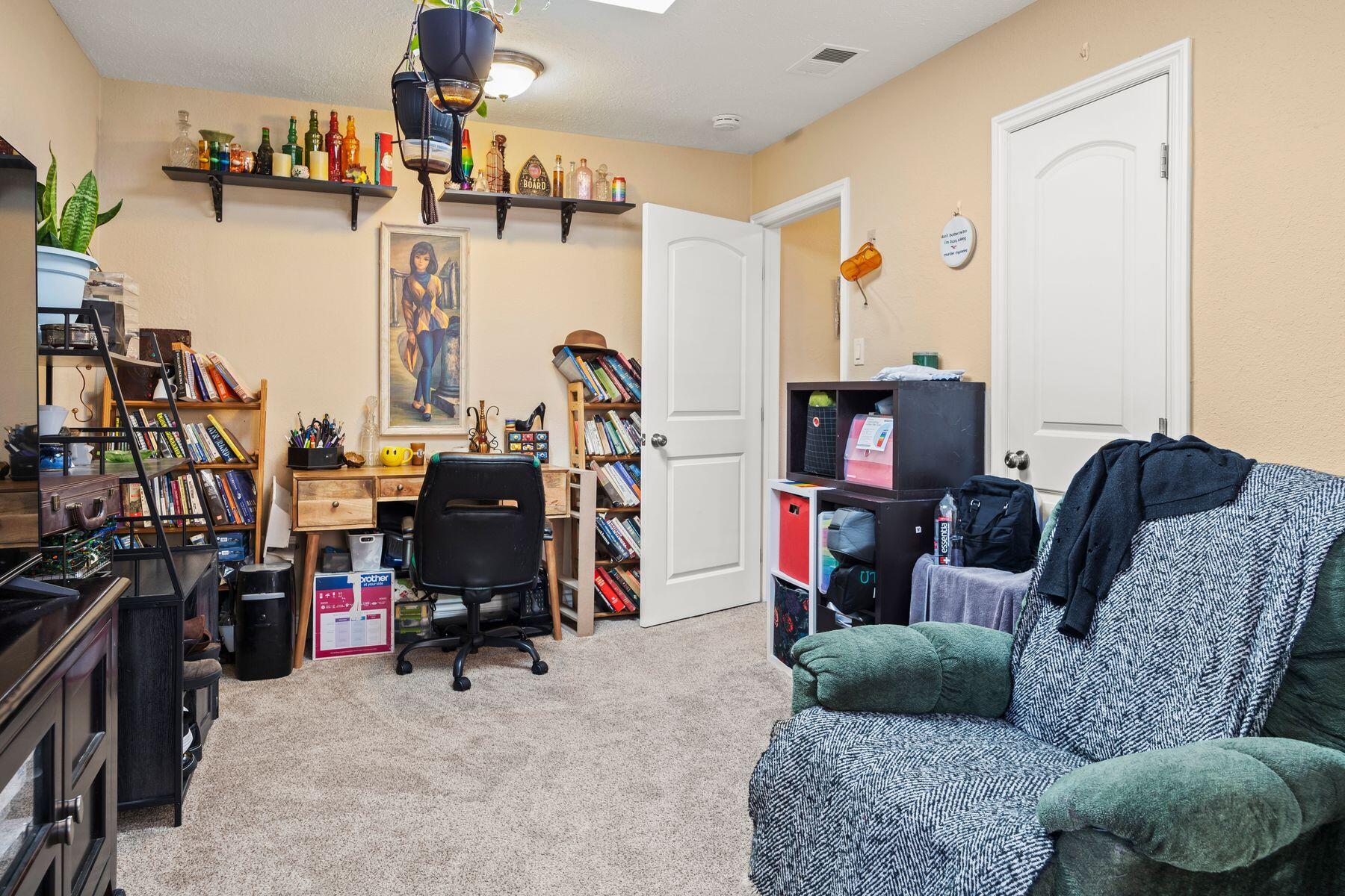 354 West Prospect Street Ventura, CA 93001 - Photo 15 of 41 a view of a livingroom with workspace and a couch