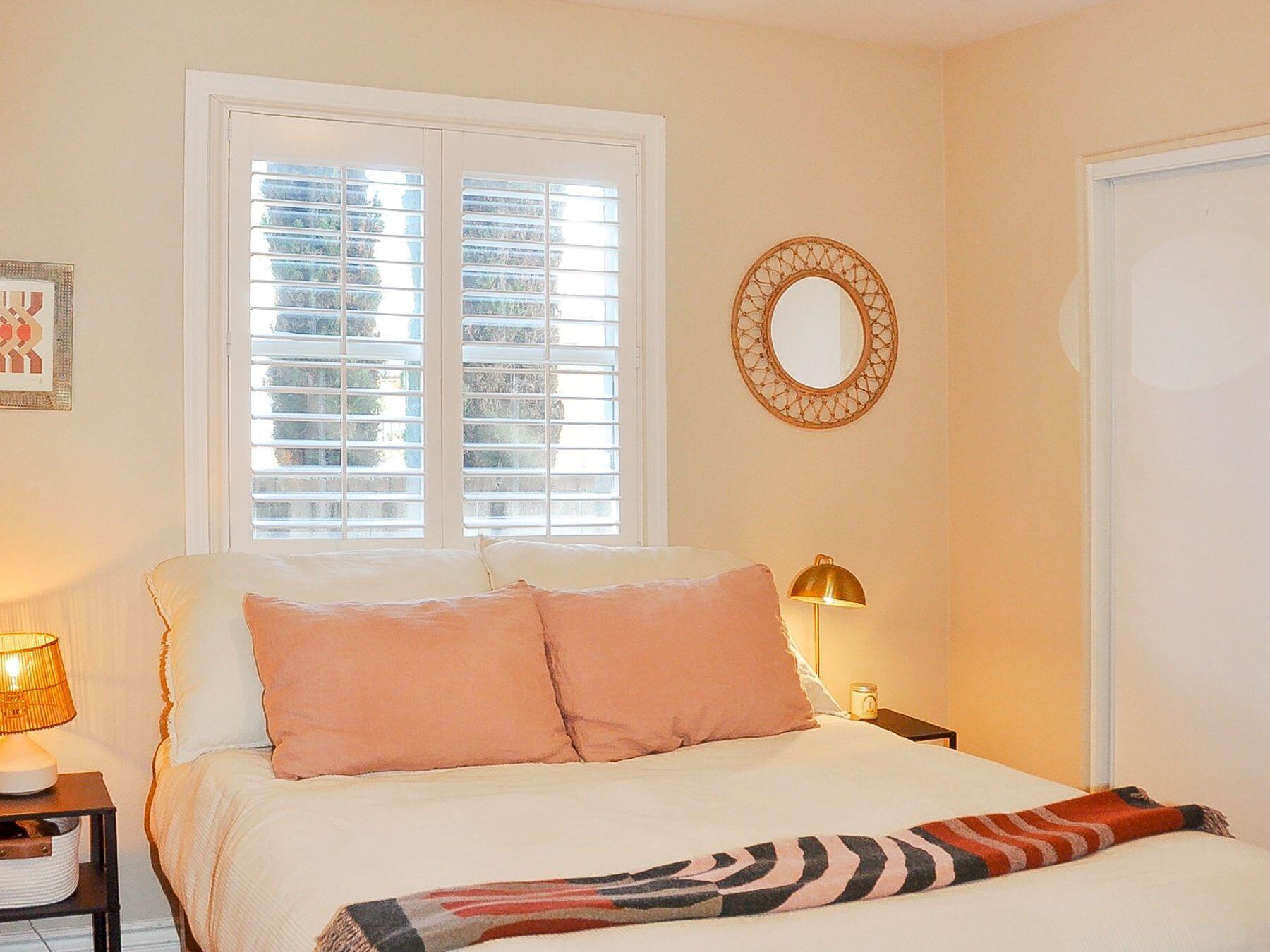 354 West Prospect Street Ventura, CA 93001 - Photo 32 of 41 a bedroom with a bed and a chair