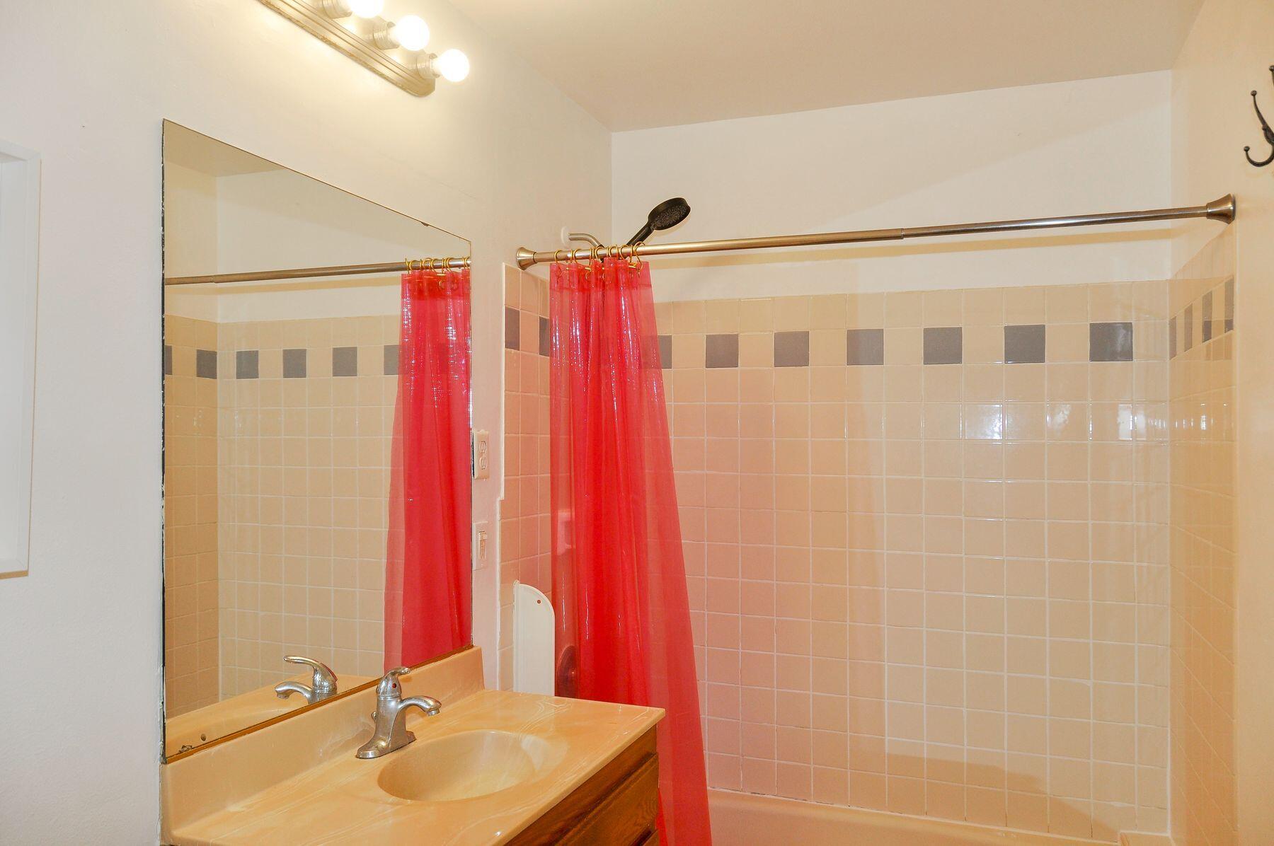 354 West Prospect Street Ventura, CA 93001 - Photo 33 of 41 a bathroom with a sink and a shower