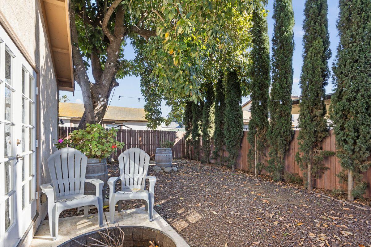 354 West Prospect Street Ventura, CA 93001 - Photo 35 of 41 a view of a chairs and table in backyard