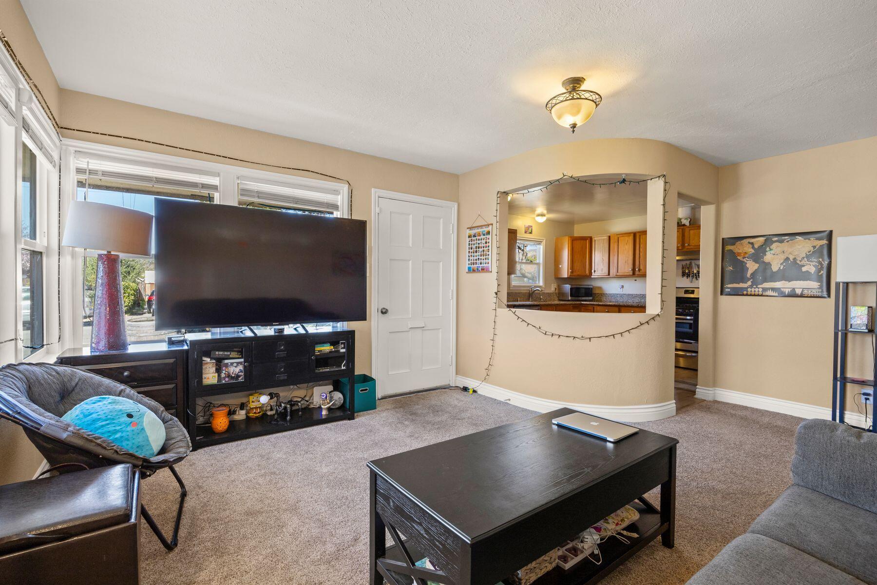 354 West Prospect Street Ventura, CA 93001 - Photo 7 of 41 a living room with furniture and a flat screen tv
