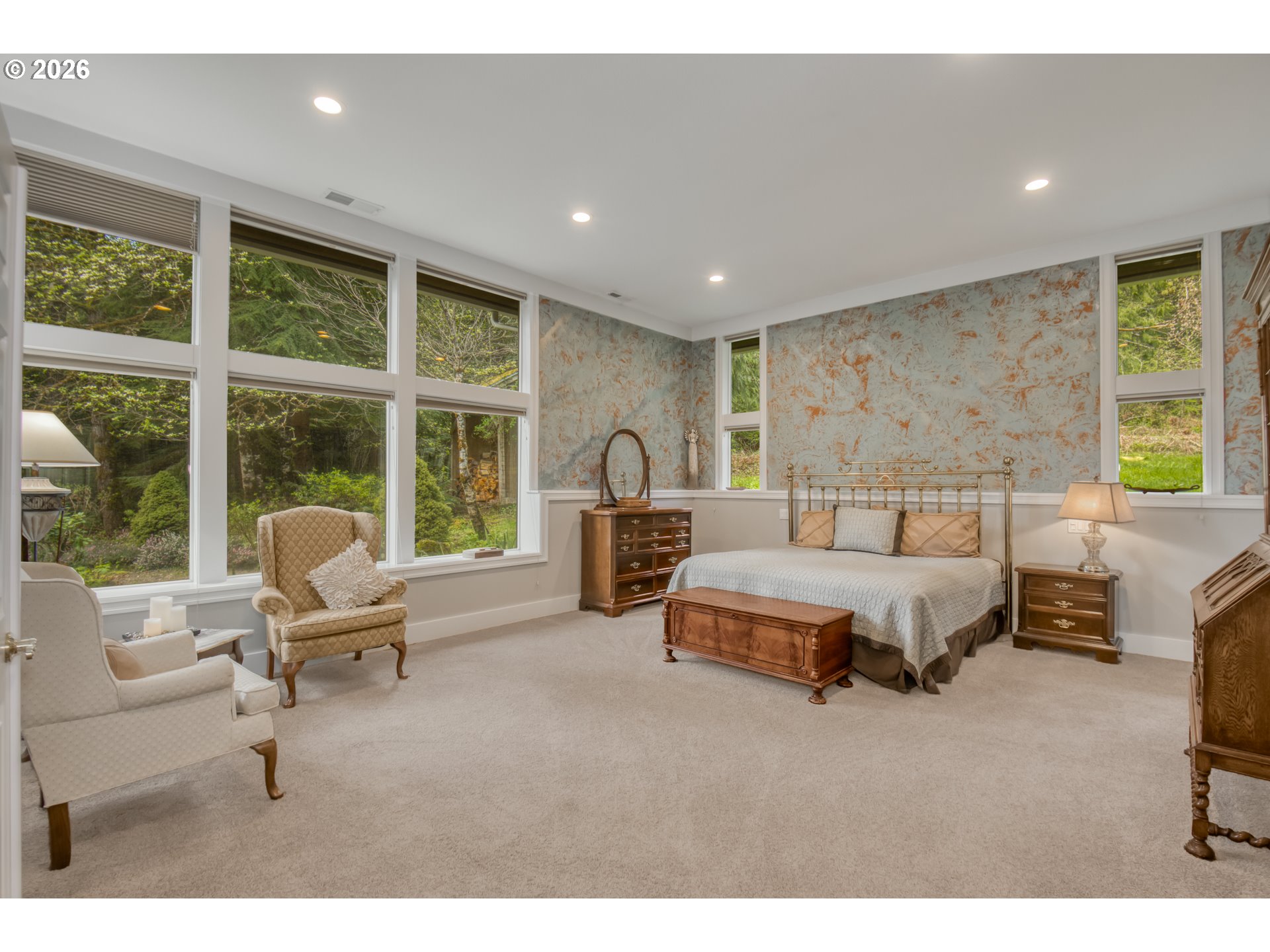 56888 Northwest Strassel Road Forest Grove, OR 97116 - Photo 15 of 48 a spacious bedroom with a bed and glass window