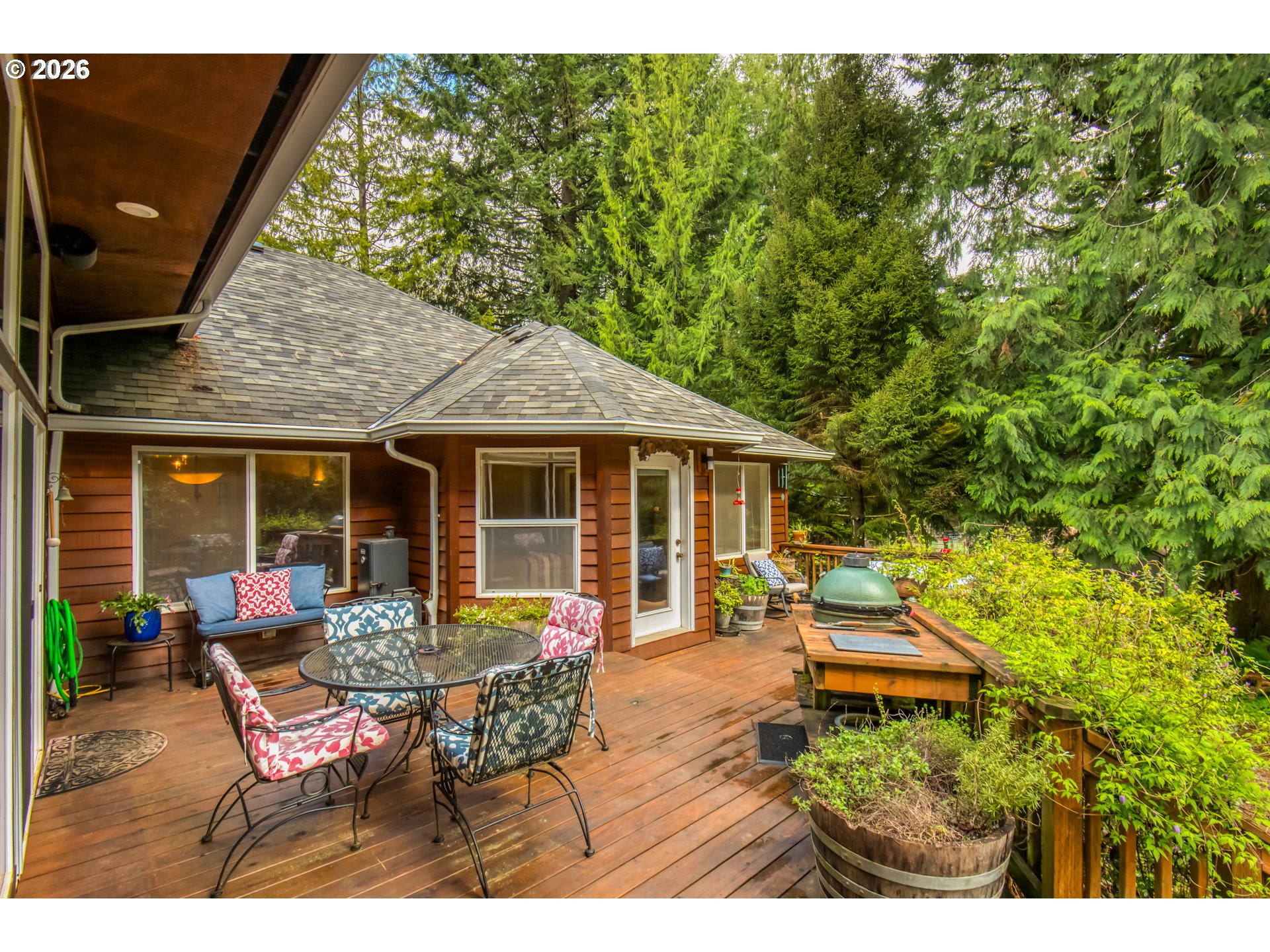 56888 Northwest Strassel Road Forest Grove, OR 97116 - Photo 30 of 48 a backyard of a house with outdoor seating