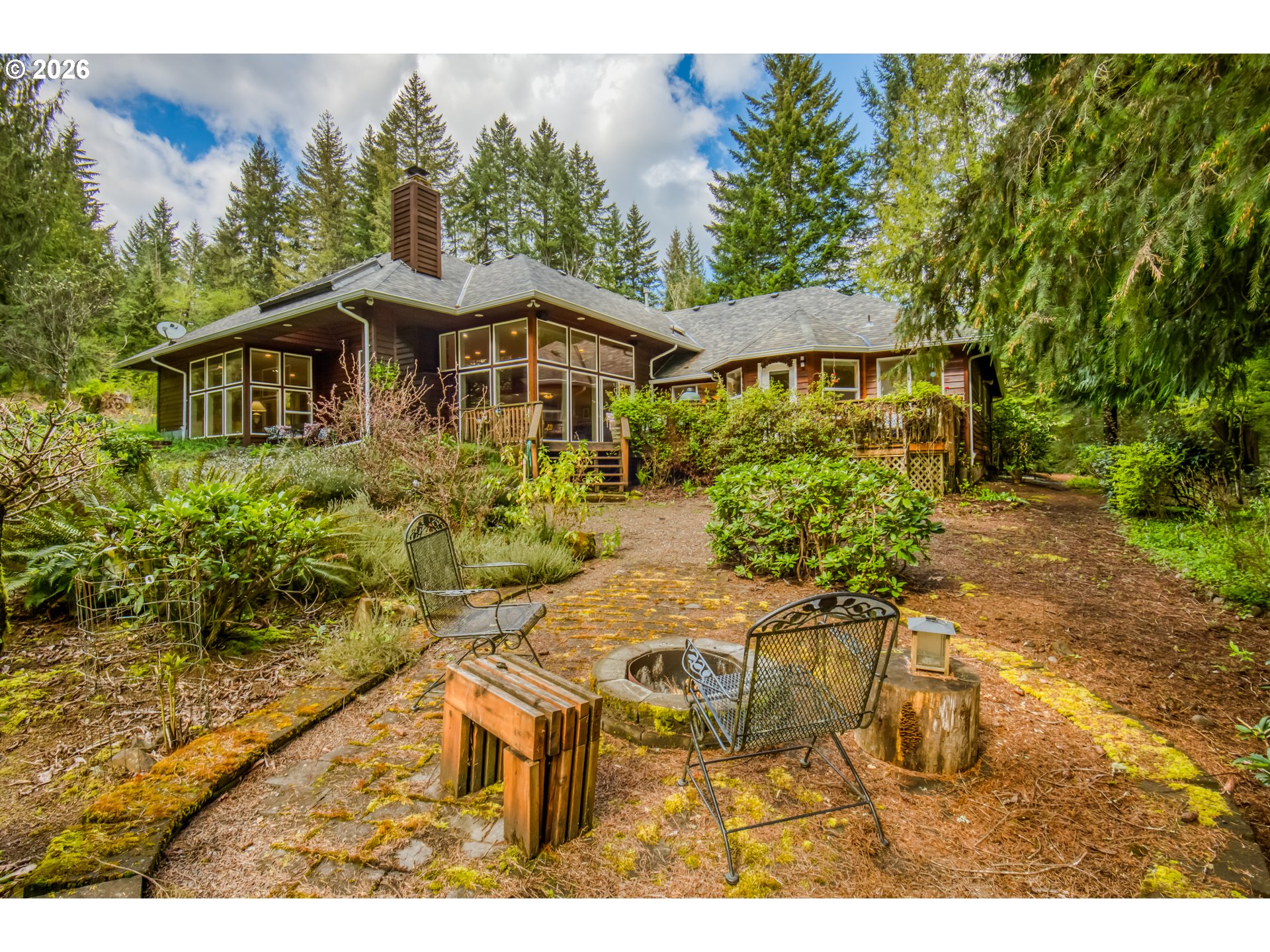 56888 Northwest Strassel Road Forest Grove, OR 97116 - Photo 33 of 48 a front view of a house with a yard