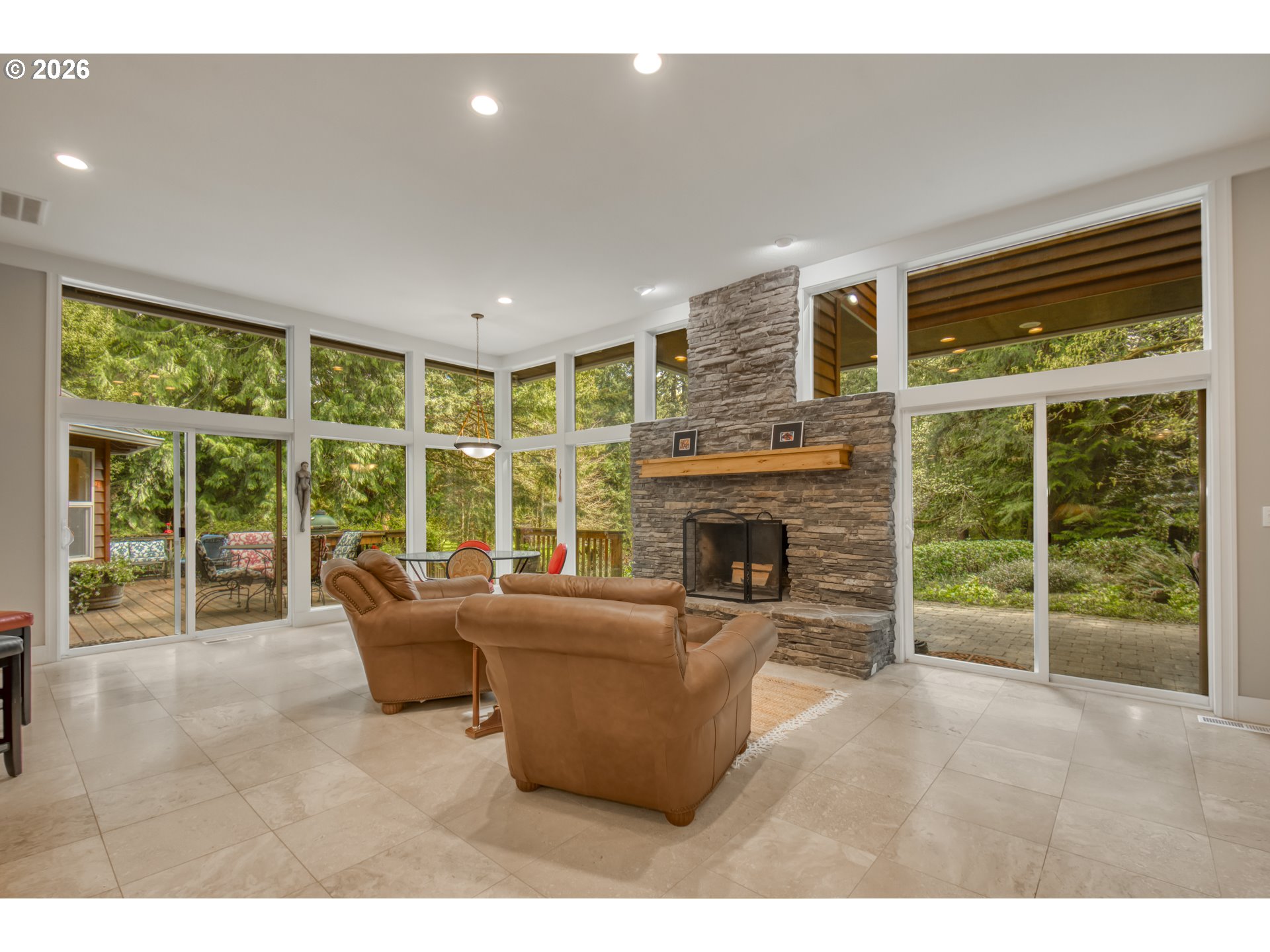 56888 Northwest Strassel Road Forest Grove, OR 97116 - Photo 10 of 48 a living room with furniture and a fireplace