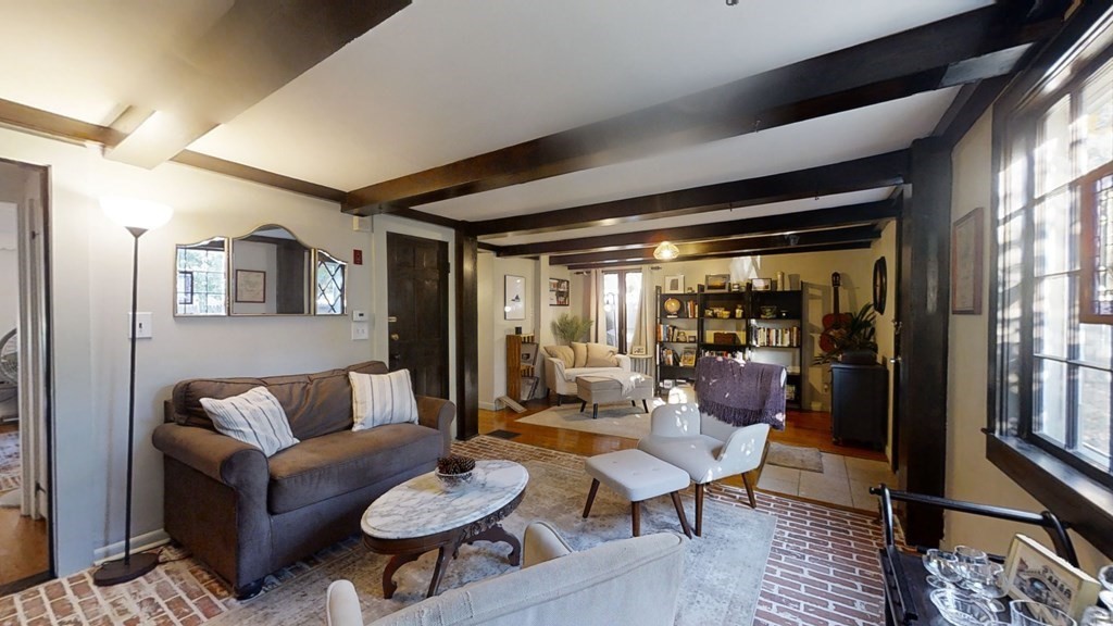 5 Pleasant Street Amesbury, MA 01913 - Photo 12 of 36 a living room with furniture and a large window