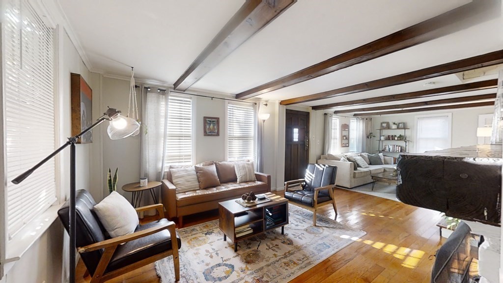 5 Pleasant Street Amesbury, MA 01913 - Photo 13 of 36 a living room with furniture and wooden floor