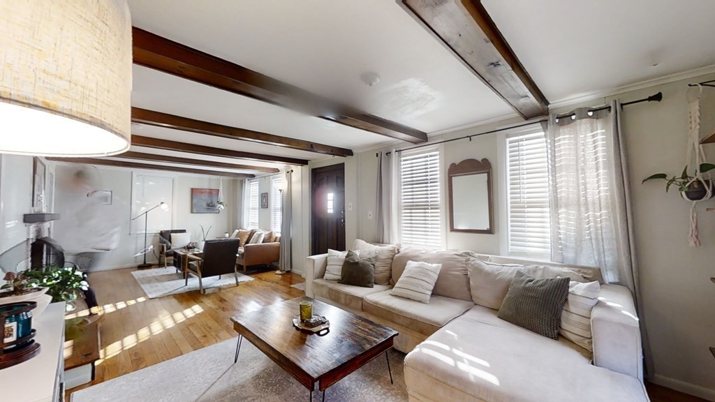 5 Pleasant Street Amesbury, MA 01913 - Photo 15 of 36 a living room with furniture and wooden floor