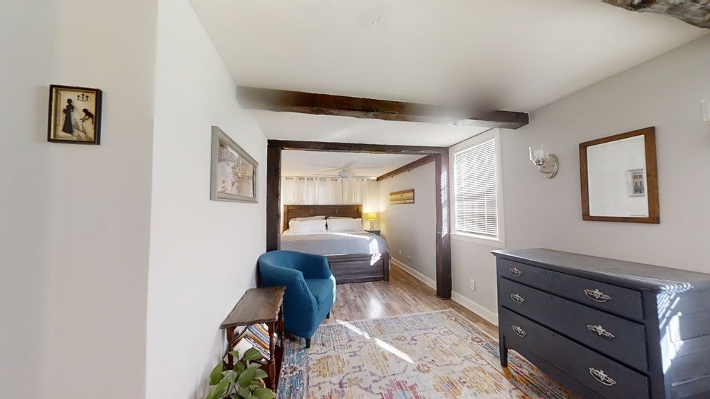 5 Pleasant Street Amesbury, MA 01913 - Photo 27 of 36 a living room with furniture and a window