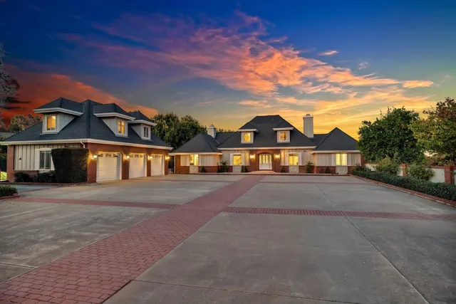 a bathroom with a sink vanity mirror and toilet