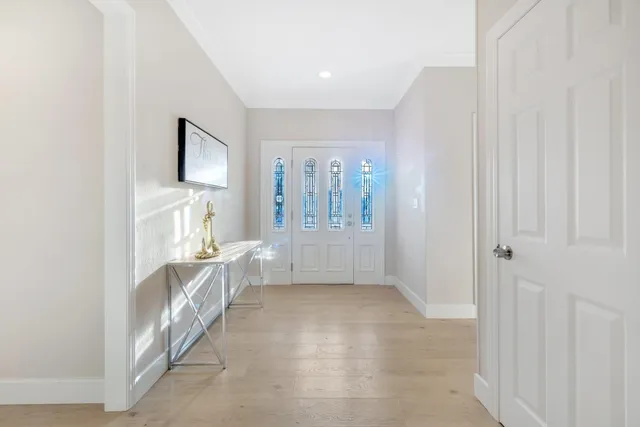 a spacious bedroom with a bed and a couch