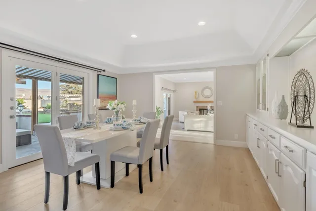 a bedroom with a bed and a table