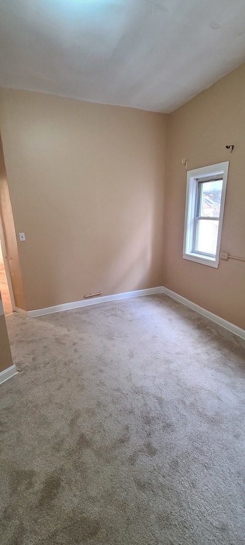 1332 West 18th Street, Unit 2F Chicago, IL 60608 - Photo 11 of 11 a view of room and window