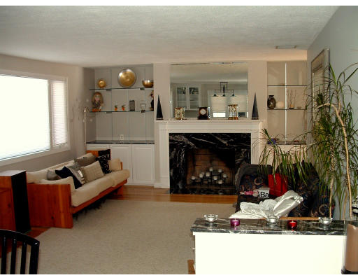 36 Red Barn Road Wayland, MA 01778 - Photo 12 of 12 a living room with furniture and a fireplace