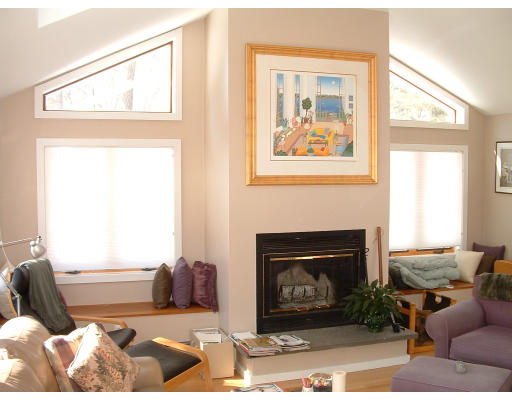 36 Red Barn Road Wayland, MA 01778 - Photo 5 of 12 a living room with furniture a window and a fireplace