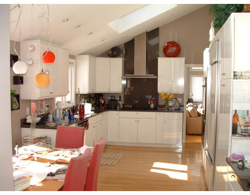 36 Red Barn Road Wayland, MA 01778 - Photo 6 of 12 a kitchen with a refrigerator and a stove top oven