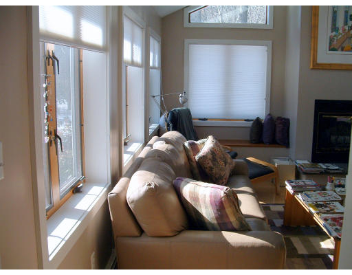 36 Red Barn Road Wayland, MA 01778 - Photo 8 of 12 a living room with furniture and a fireplace