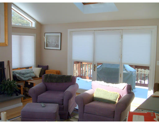 36 Red Barn Road Wayland, MA 01778 - Photo 9 of 12 a living room with furniture wooden floor and a large window