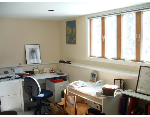 36 Red Barn Road Wayland, MA 01778 - Photo 10 of 12 a view of a workspace with furniture and a window